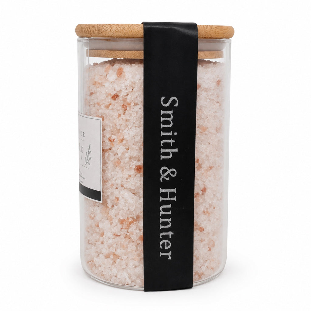 Side view of Smith & Hunter Breathe eucalyptus bath salts 1 kg jar with branded black ribbon