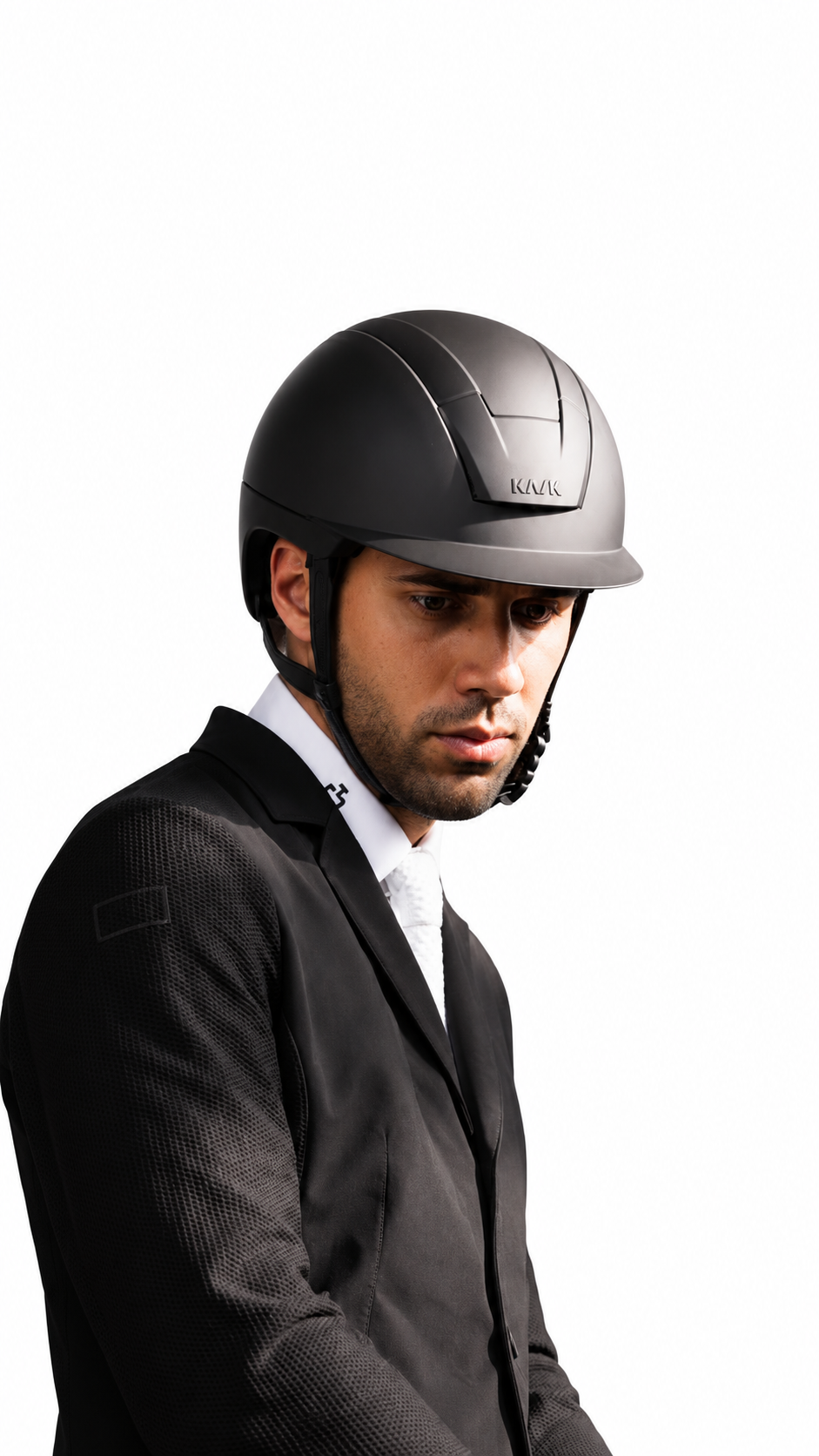 Rider wearing a matte black KASK Kooki riding helmet