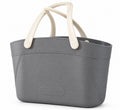 Grey Riviera silicone carryall tote with textured finish and cream handles